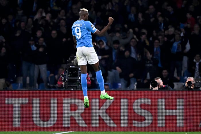 Victor Osimhen pictured celebrating after scoring for Napoli in a 1-1 draw with Barcelona in February 2024